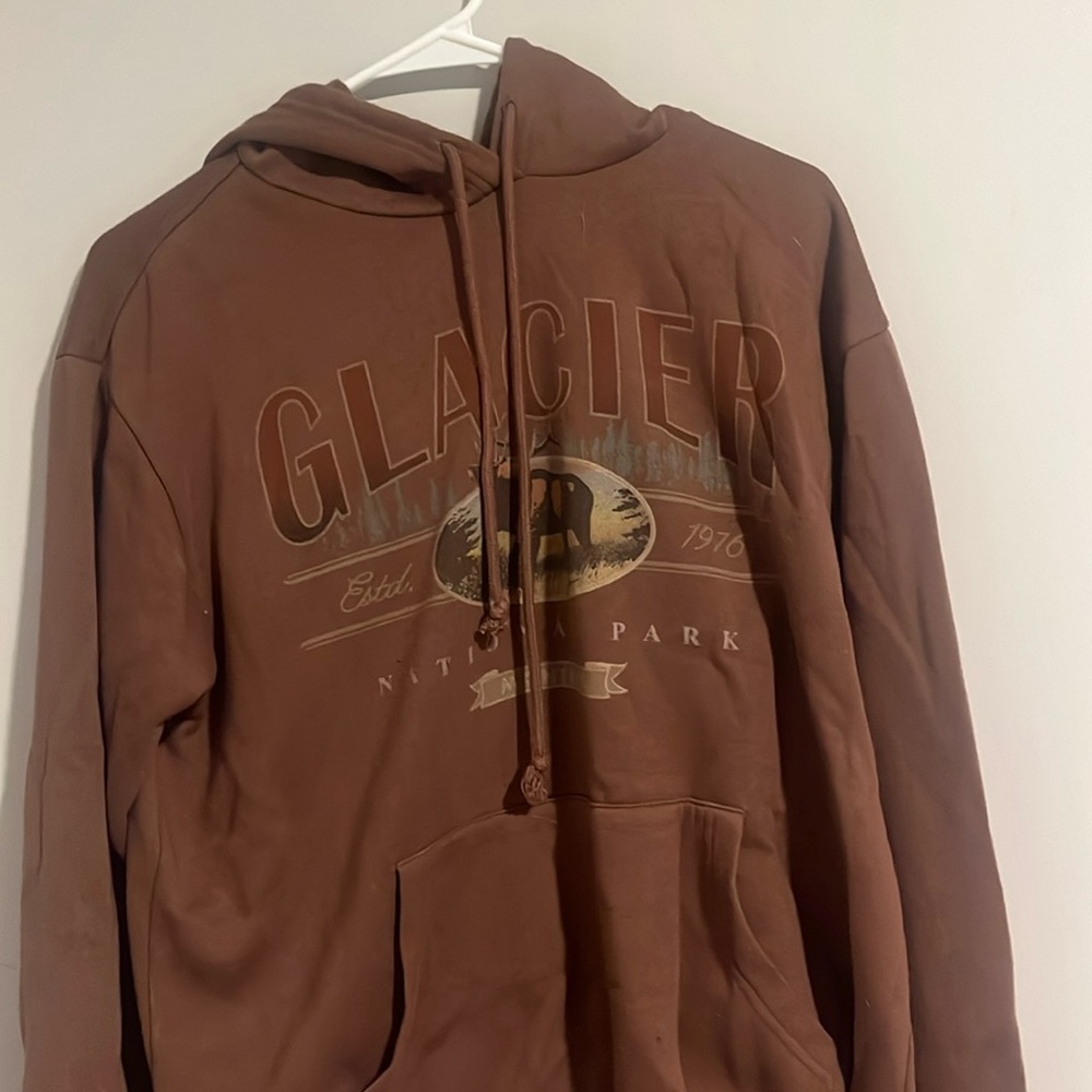 Tilly’s “Glacier National Park” brown hooded sweatshirt